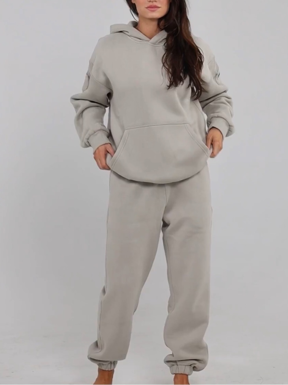 Women's oversized hoodie and sweatpant set.